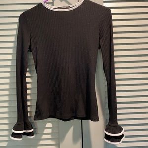Black ruffled sweater